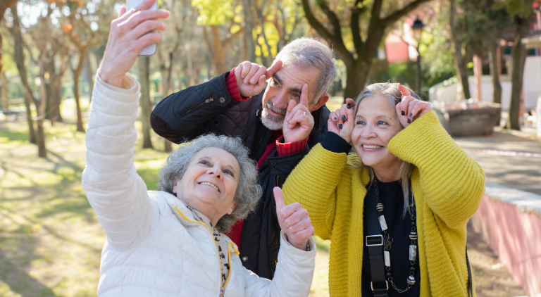 A group of elderly people taking a self-portrait