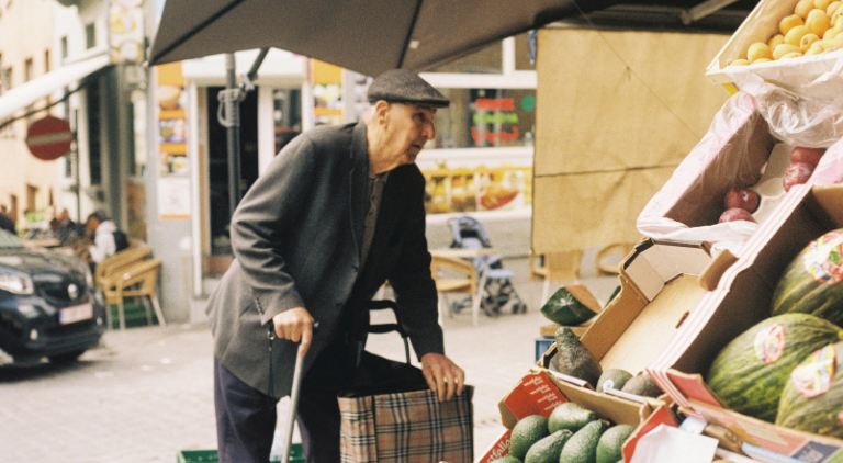 Elderly Shopping at a street market