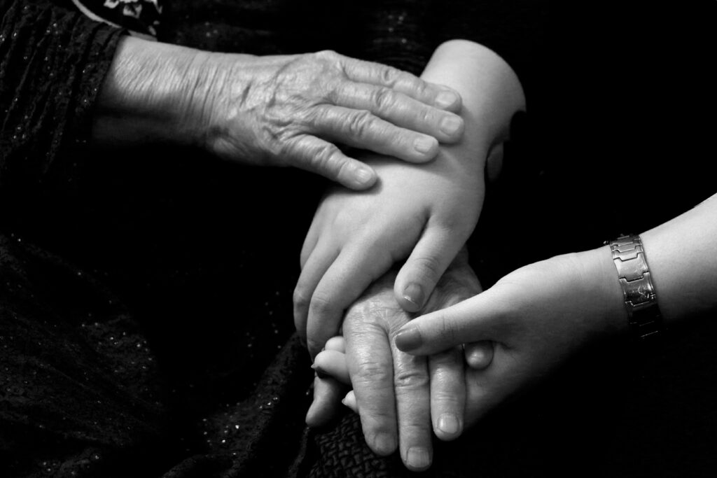 How Quickly Can You Arrange in-Home Care Services for Your Aging Parent? 2 holding hands